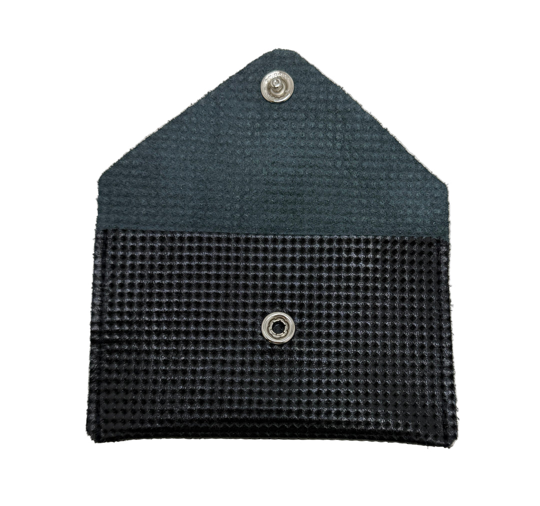 Textured pouch with button closure on a white background #color_black