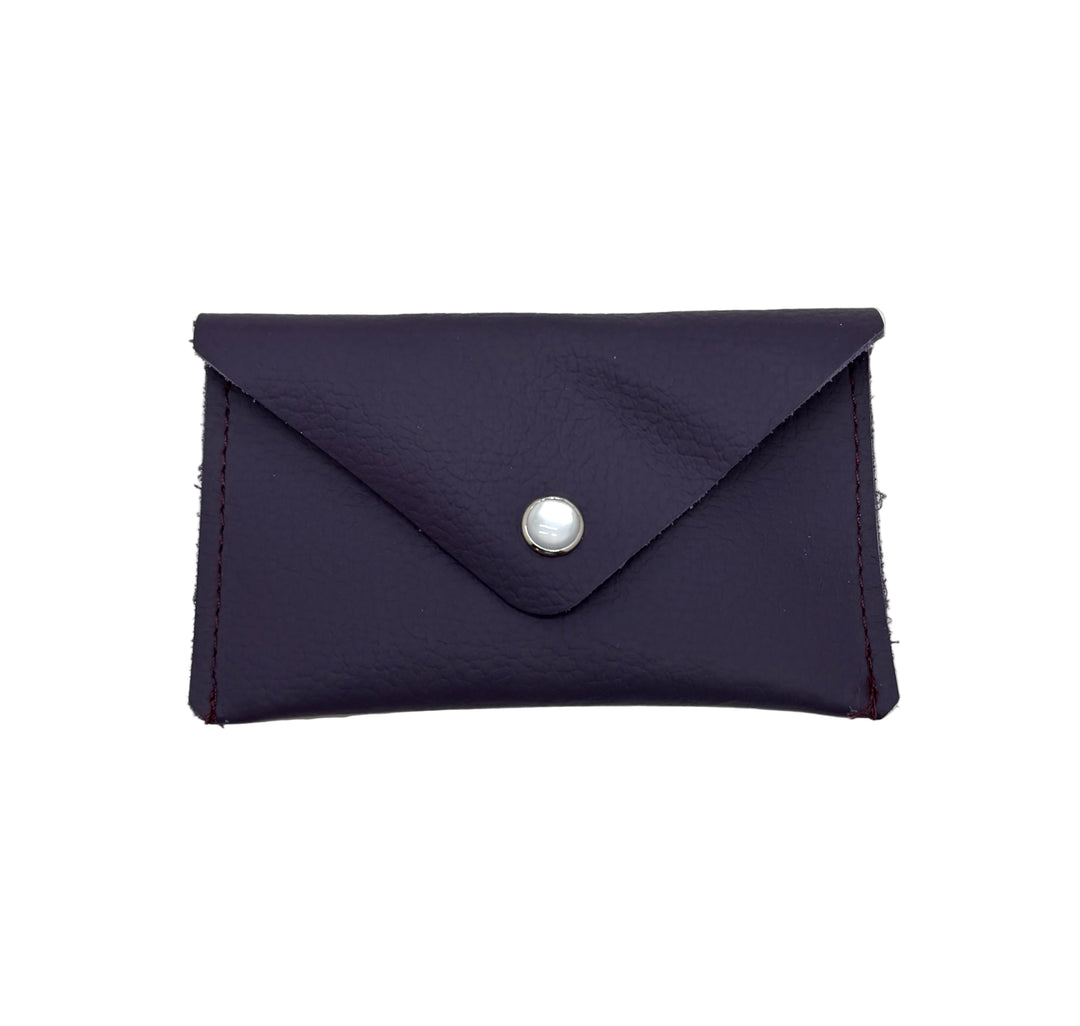Purple blue cardholder with a silver button on a white background #color_plum