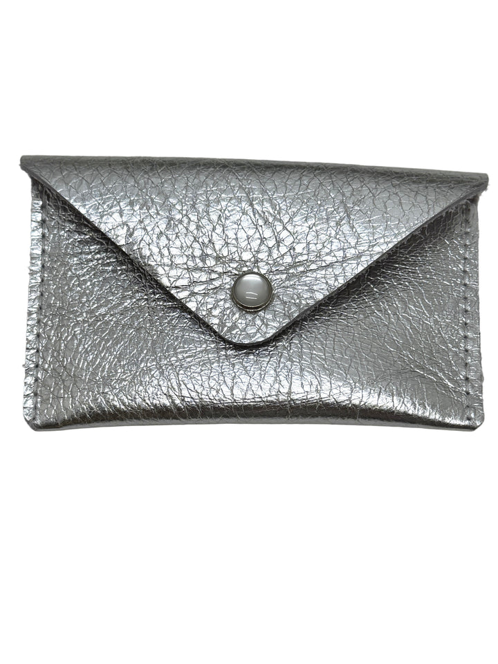 Silver textured clutch bag with a button on a light gray background #color_silver