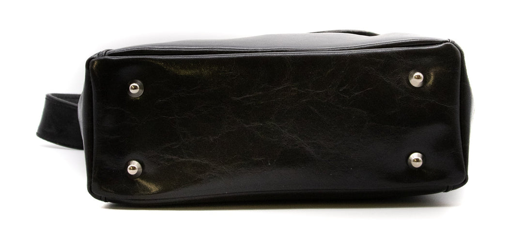 Black leather handbag with silver studs on a white background