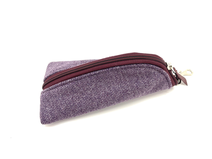 Purple textured zippered pouch on a white background#color_amethyst-tweed