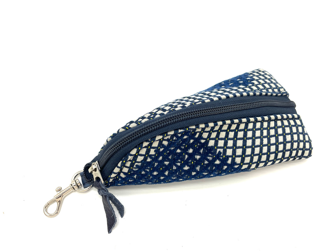 Blue and white checkered pouch with a zipper on a white backgroundconstellation-cobalt