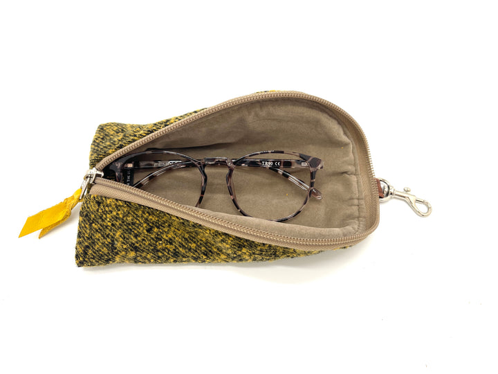 Eyeglasses in a yellow patterned case on a white background#color_mustard-marle