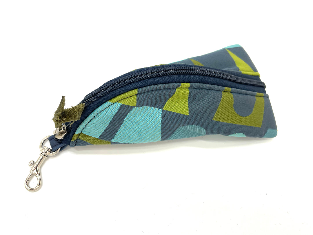 Fabric pouch with geometric pattern on a white background#color_satellite-sally