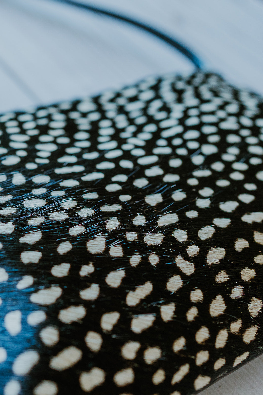 Bossa Nova Medium Crossbody Bag from Limited Edition Fabric made in USA#color_black-white-cowhide