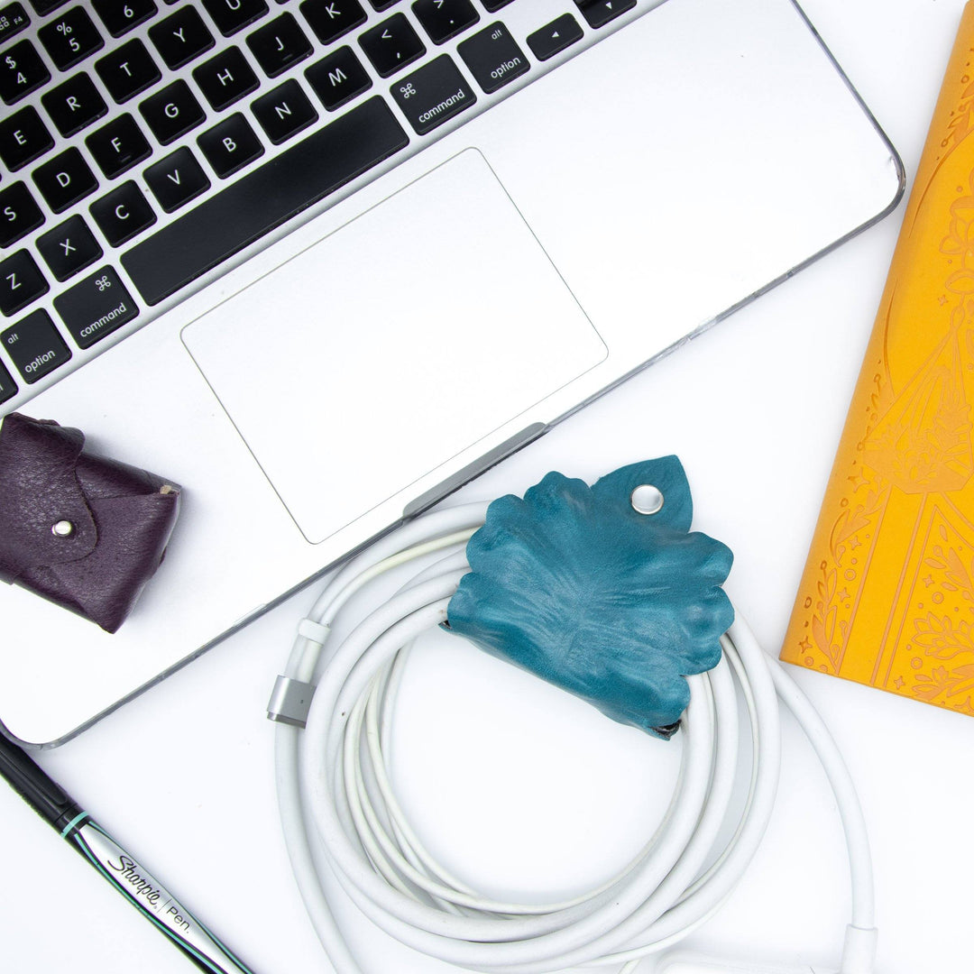 computer keyboard with bundled cord inside Laptop Leaf Cord Wrap