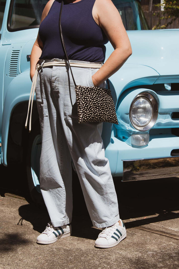 Bossa Nova Medium Crossbody Bag from Limited Edition Fabric made in USA#color_black-white-cowhide