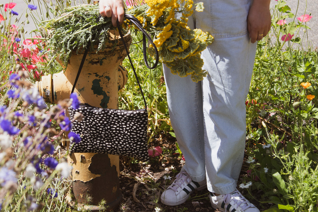 Bossa Nova Medium Crossbody Bag from Limited Edition Fabric made in USA#color_black-white-cowhide